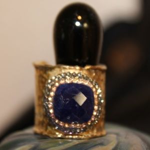 Purple-blue crystal ring.